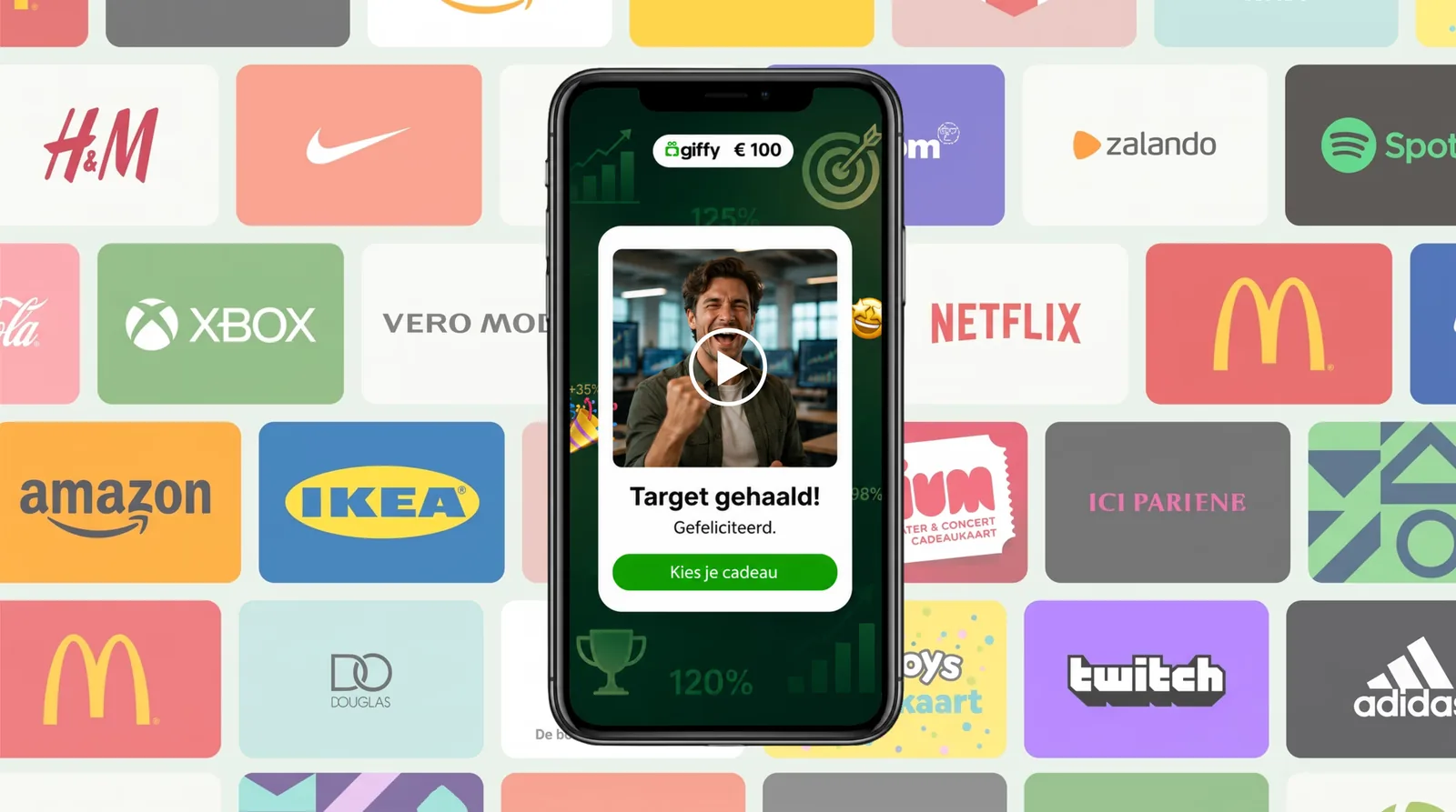 De Giffy-app toont 'Target gehaald!' met een persoonlijke videoboodschap, tegen een achtergrond vol cadeaukaart-merken waaruit de ontvanger zelf kiest